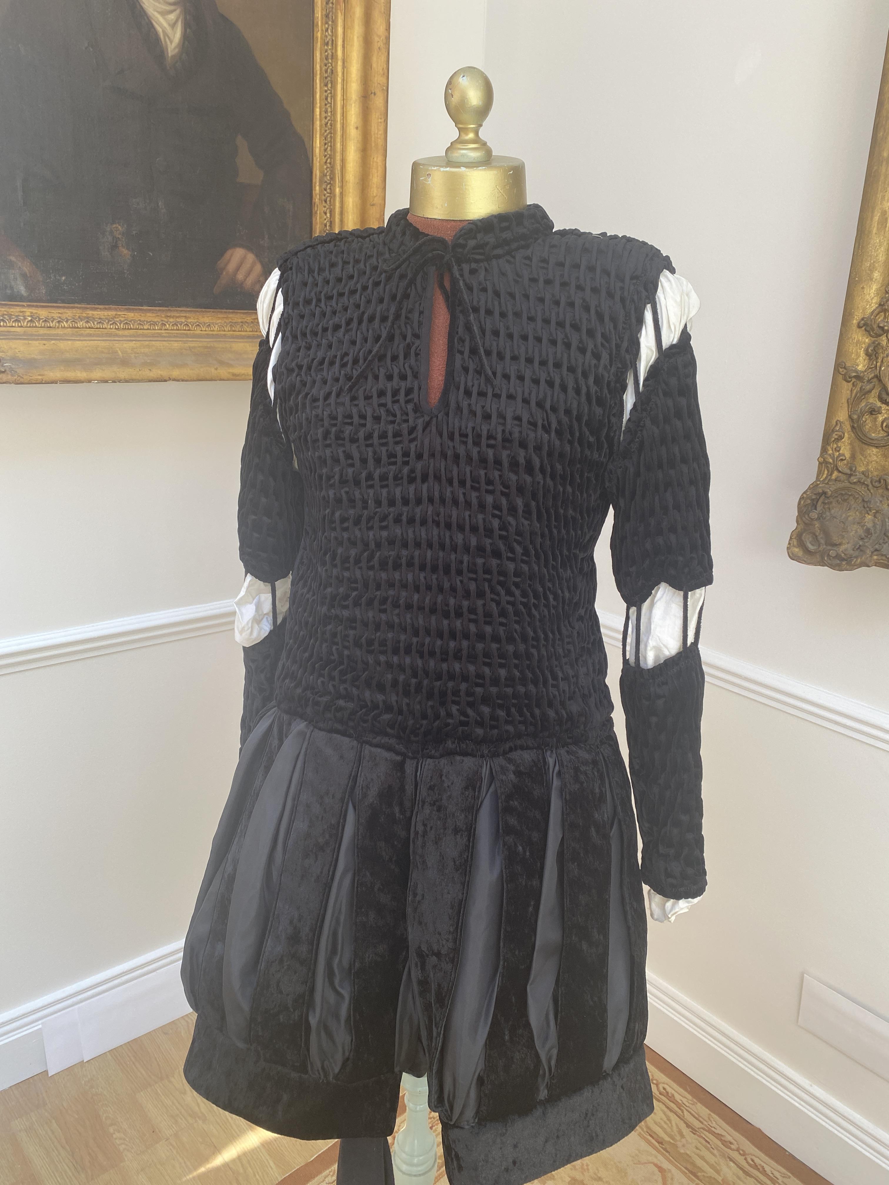 A men’s Elizabethan style tunic and pants, with tights and cod-piece. Size Small / Medium